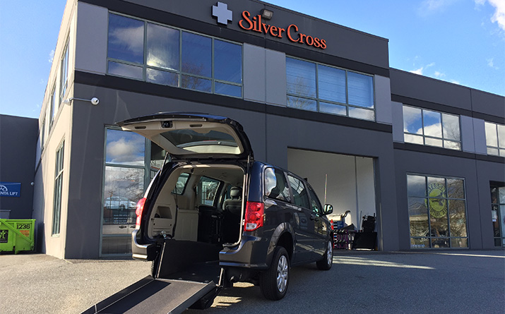 Rear entry van with trunk open in front of Silver Cross Automotive Maple Ridge, BC storefront